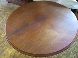 Walnut round tripod pedestal table, 34" diameter