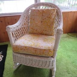 White Wicker rocking chair with cushion and pillow