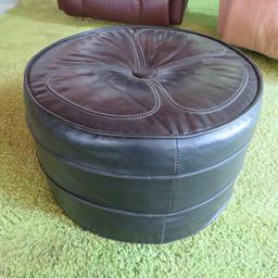 Cute black vinyl round ottoman