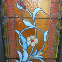 Lovely jeweled floral stained and leaded glass window