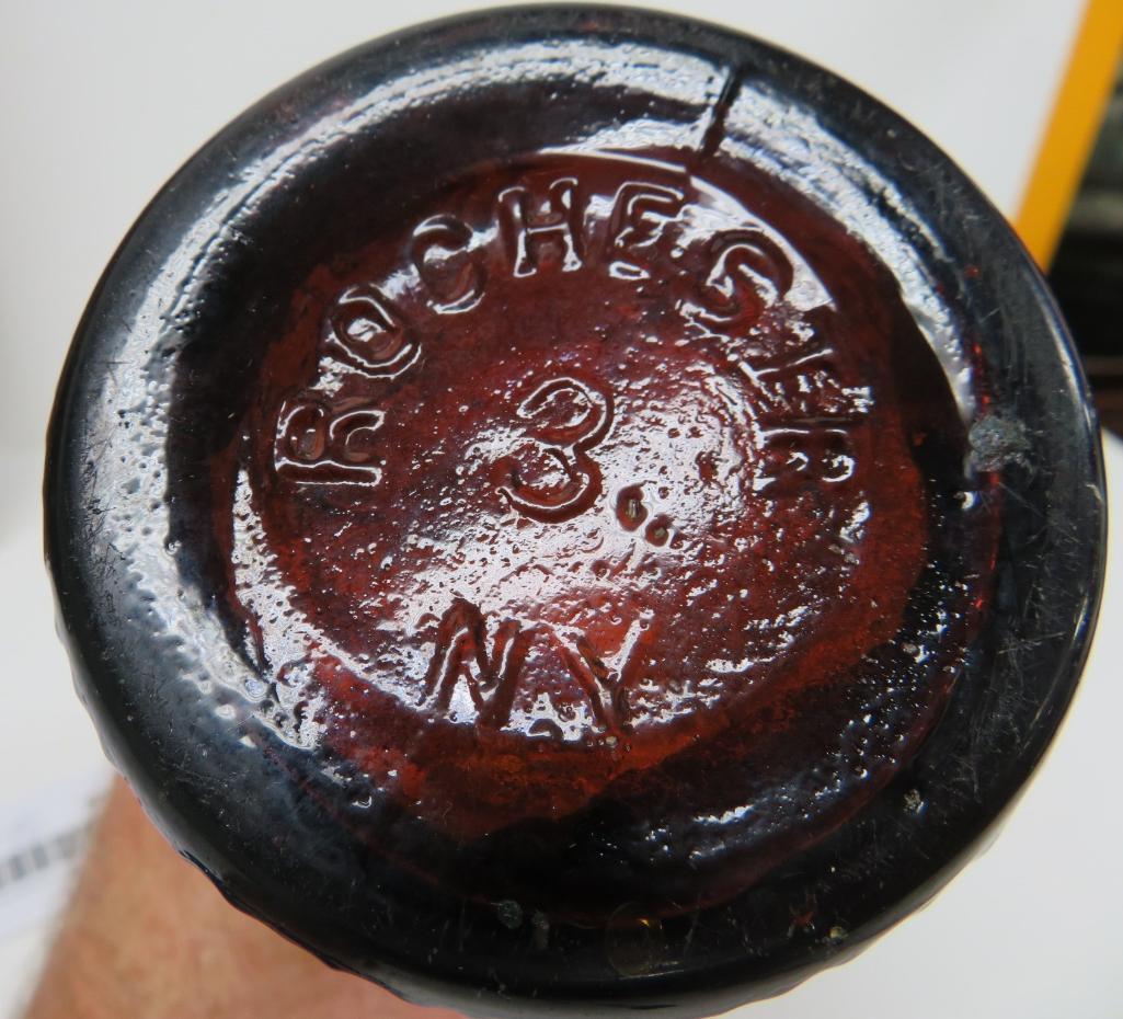 Tippecanoe log bitters bottle, HH Warner & Co, amber, 9"
