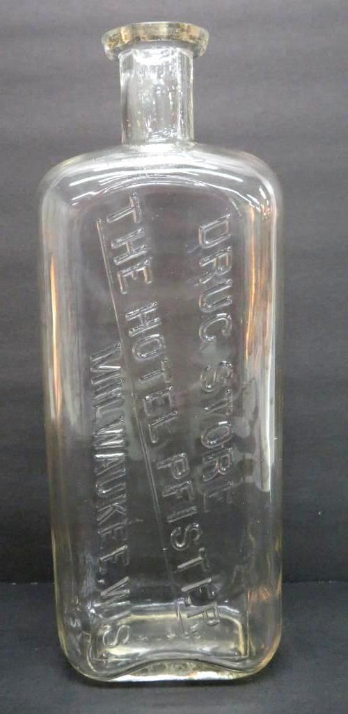 Drug Store Bottle, Hotel Pfister Milwaukee, 1882, 10"