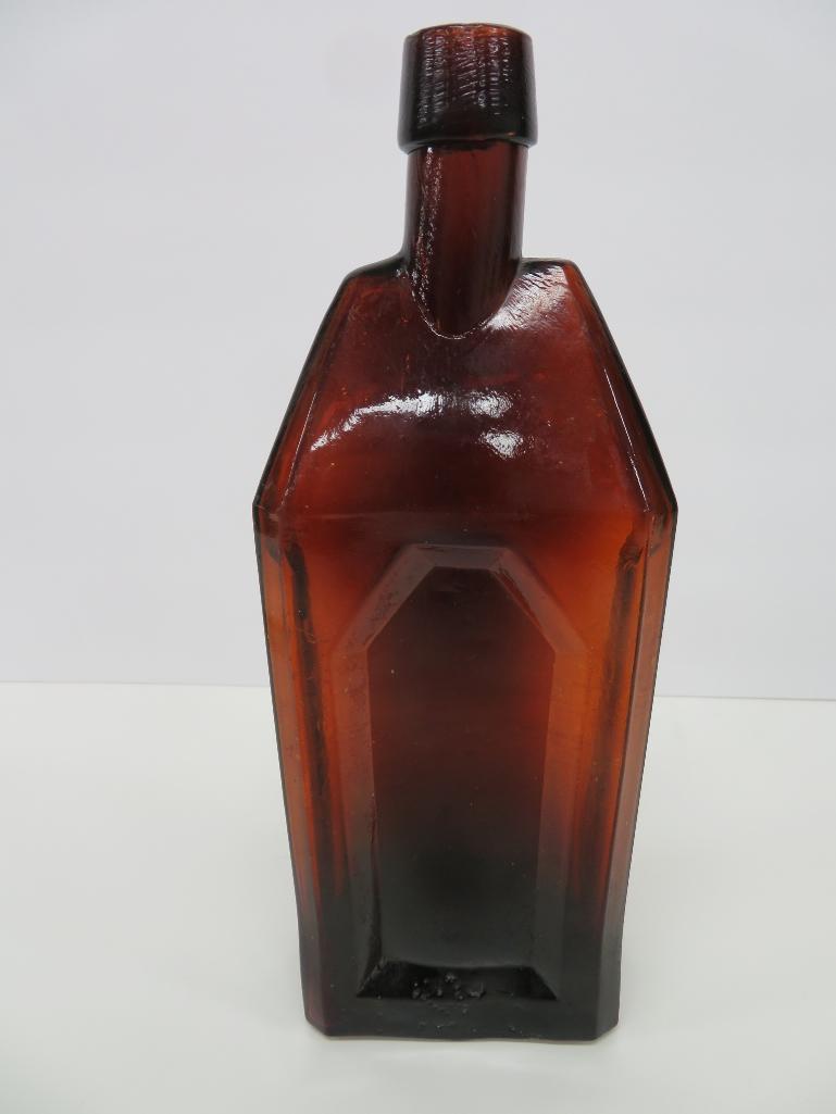 E Schneiders amber whiskey bottle, 10"