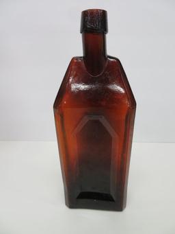 E Schneiders amber whiskey bottle, 10"