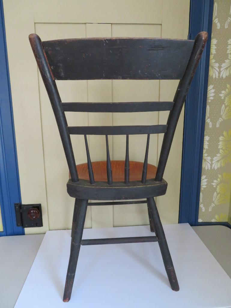 Early primitive solid seat chair