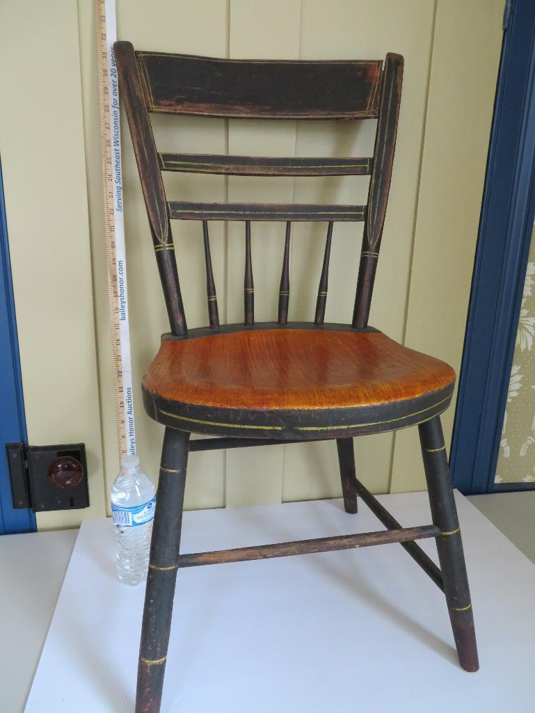 Early primitive solid seat chair