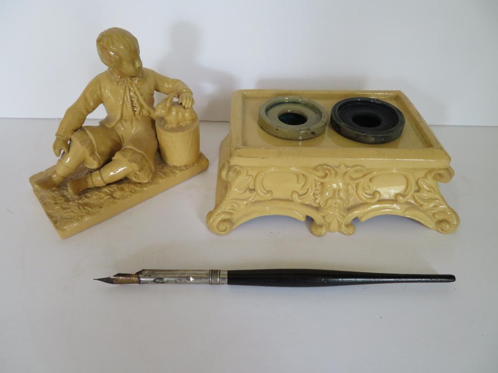 Early figural double inkwell, boy and rabbit, 6"