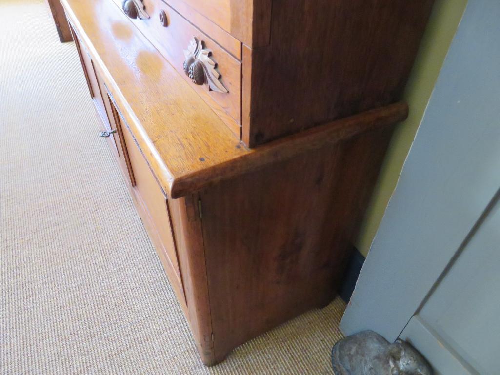 Outstanding c. 1840 cupboard, two glass doors, drawers and doors on base