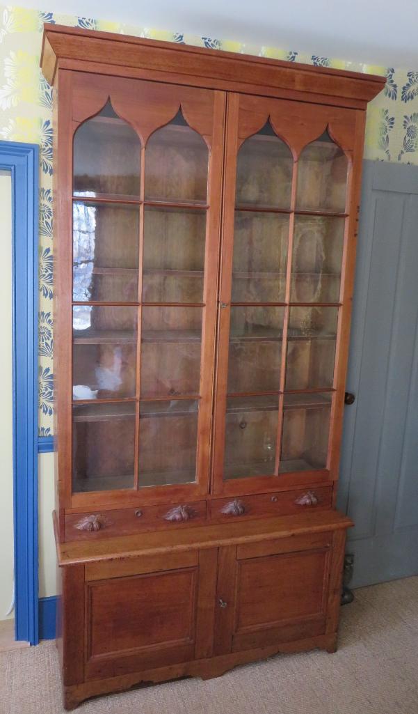 Outstanding c. 1840 cupboard, two glass doors, drawers and doors on base