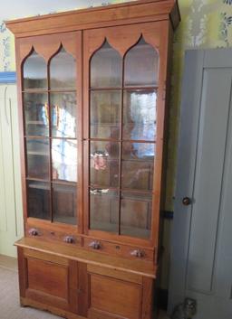 Outstanding c. 1840 cupboard, two glass doors, drawers and doors on base