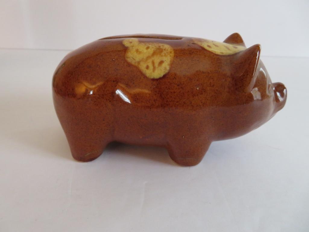 Stoneware piggy bank, Bennington style glaze, 6"