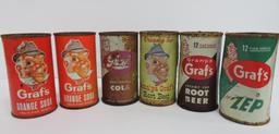 Six steel Graf's soda cans, 12 oz