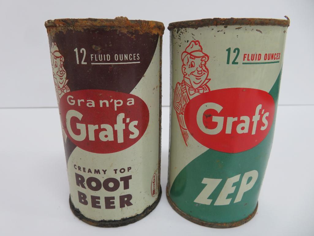 Six steel Graf's soda cans, 12 oz