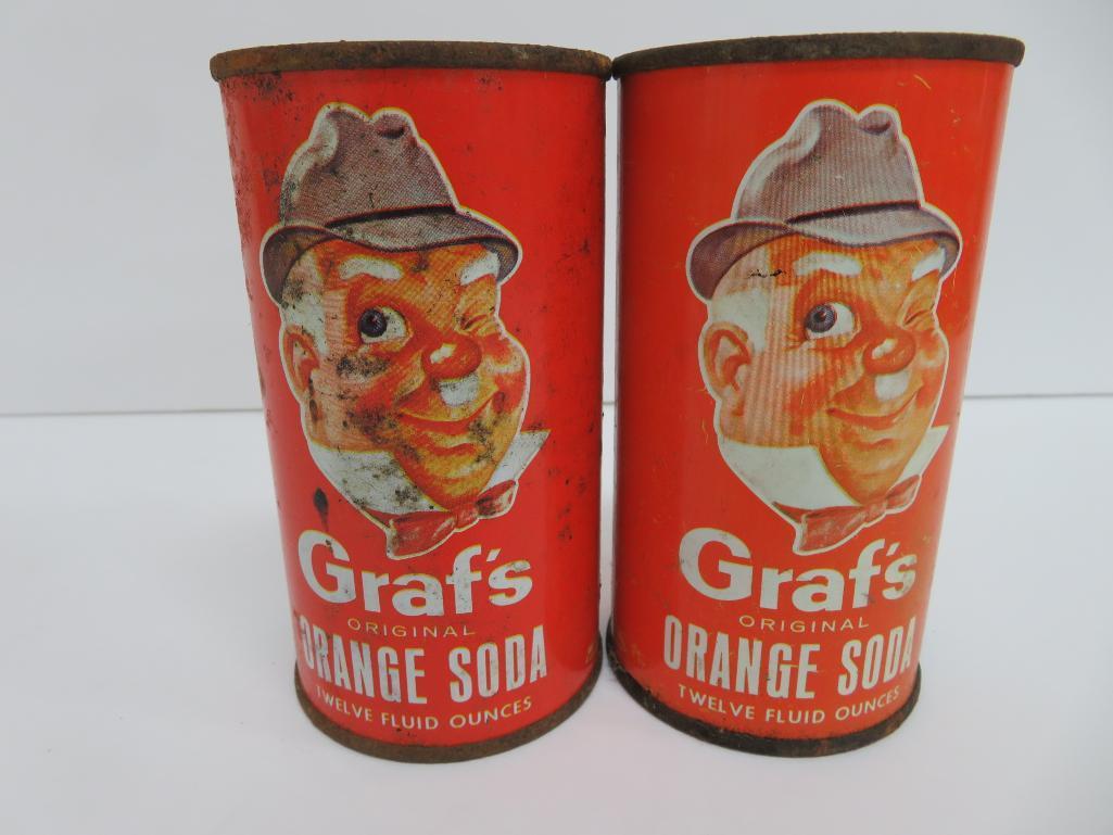 Six steel Graf's soda cans, 12 oz