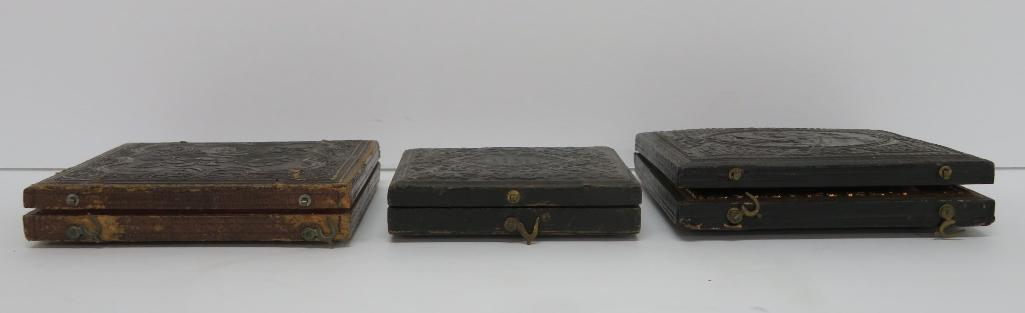 Three daugurotype cases with glass images
