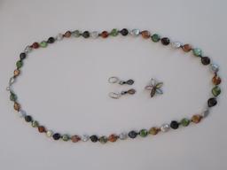 Beaded necklace, earrings and floral shape enhancer