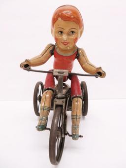 Hard to find Marx Wonder Cyclist, tin wind up boy on tricycle with spoke wheels, c 1920, 1st version