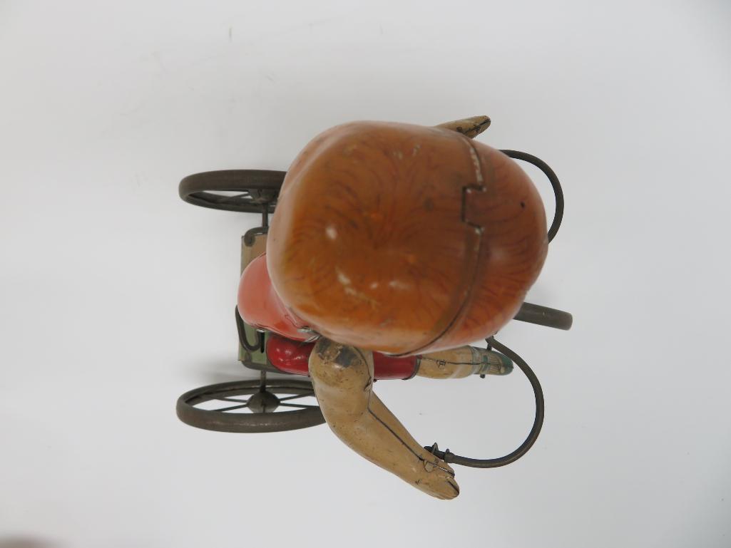 Hard to find Marx Wonder Cyclist, tin wind up boy on tricycle with spoke wheels, c 1920, 1st version