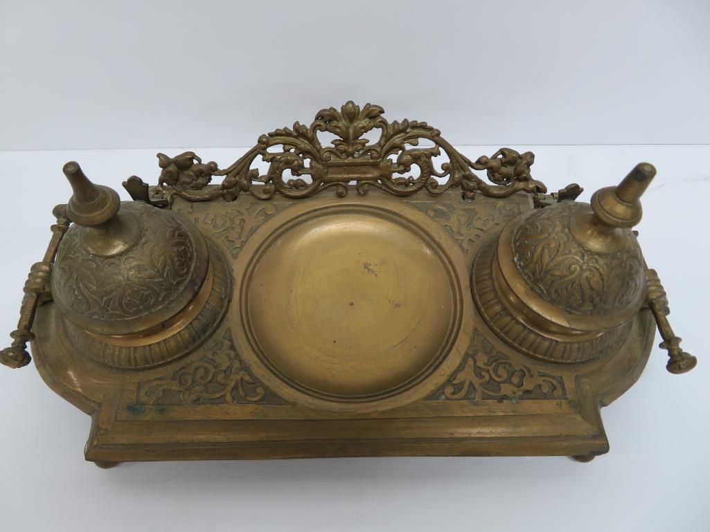 Ornate double metal inkwell with pen tip tray