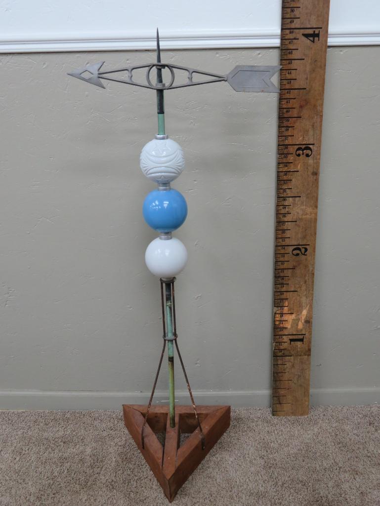 Lightening rod with directional arrow and three rod balls