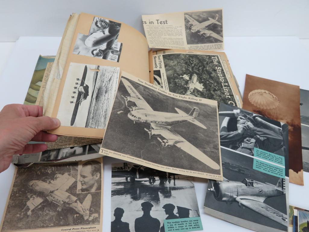 Military books, yearbooks and scrapbook from pilot in photo and uniform