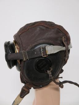 WWII Leather aviator-pilot cap, googles, oxygen mask and control stick handle