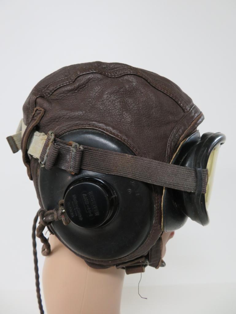 WWII Leather aviator-pilot cap, googles, oxygen mask and control stick handle