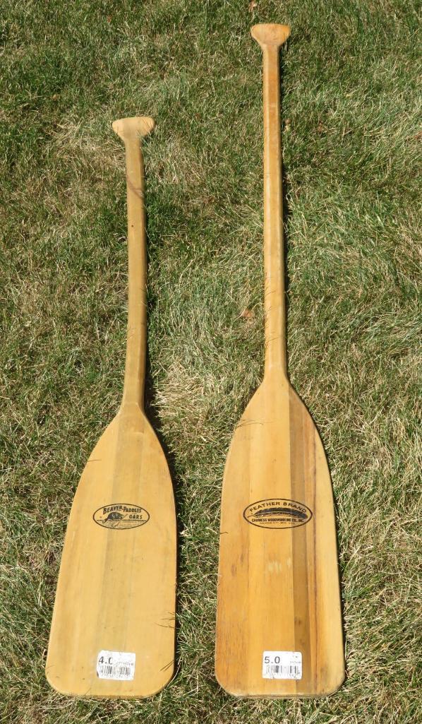 Two wooden boat paddles, 4' and 5', Beaver and Feather brands