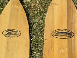 Two wooden boat paddles, 4' and 5', Beaver and Feather brands