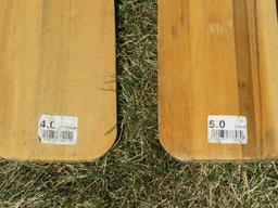 Two wooden boat paddles, 4' and 5', Beaver and Feather brands