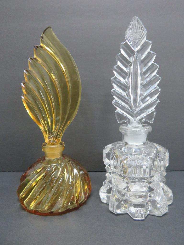 Two glass perfume bottles, 7 1/2", amber and clear