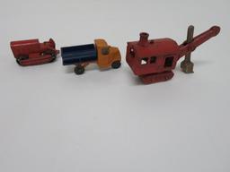 Three cast iron and Tootsie Toy commercial vehicles