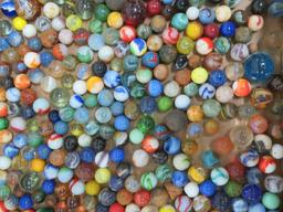 About 400 vintage marbles in old canning jar, machine made