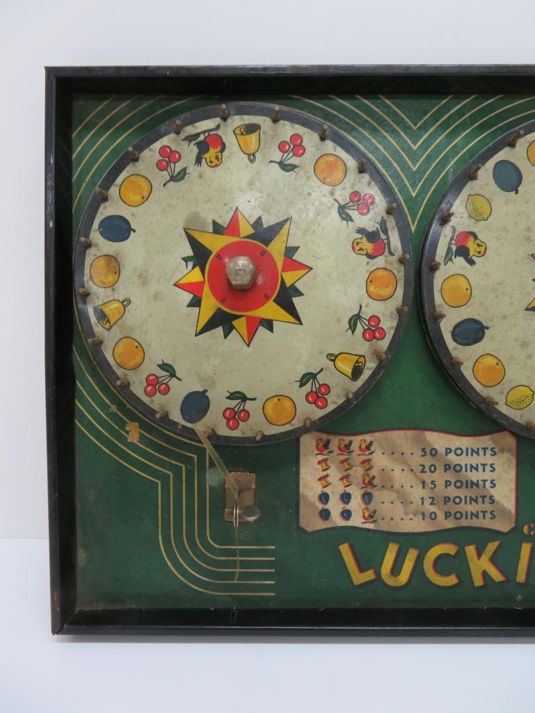Gotham Luckie Bird, carnival wheel, 3 slot machine style spinning wheel