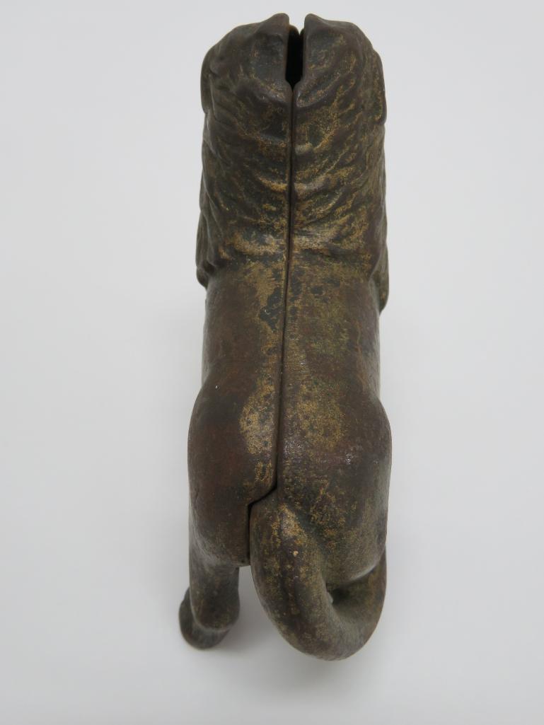 Standing Lion cast iron still bank, 4" tall and 5" long