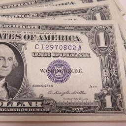 14 Sequential silver certificates, series 1957A, C12970802A to C12970815A