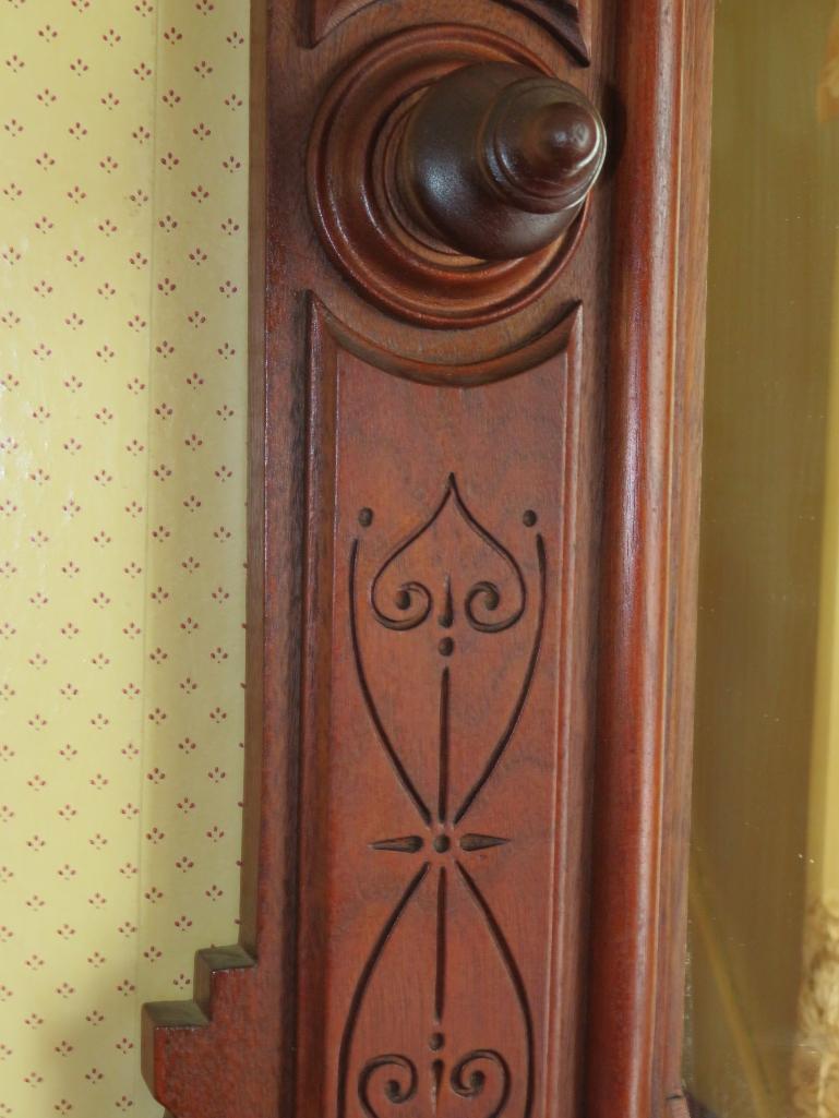 Ornately carved Walnut entry mirror with storage box