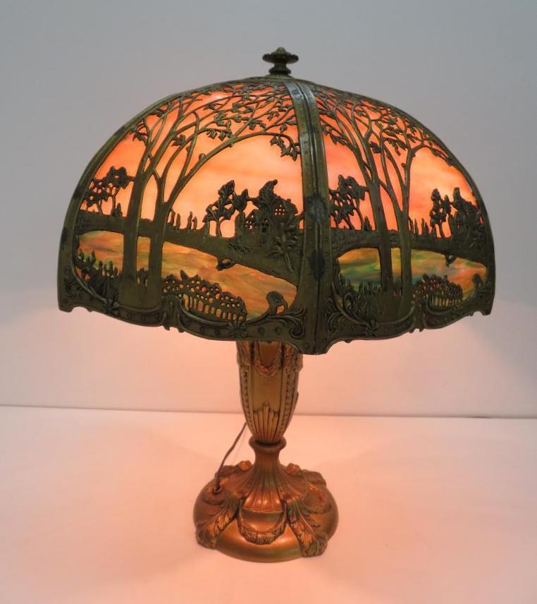 Slag glass lamp with metal overlay, scenic with cabin, 23" tall