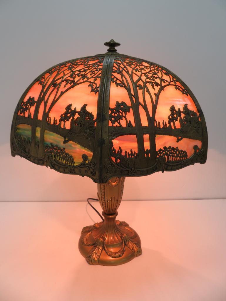 Slag glass lamp with metal overlay, scenic with cabin, 23" tall