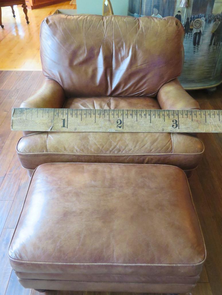 Brown leather chair and ottoman