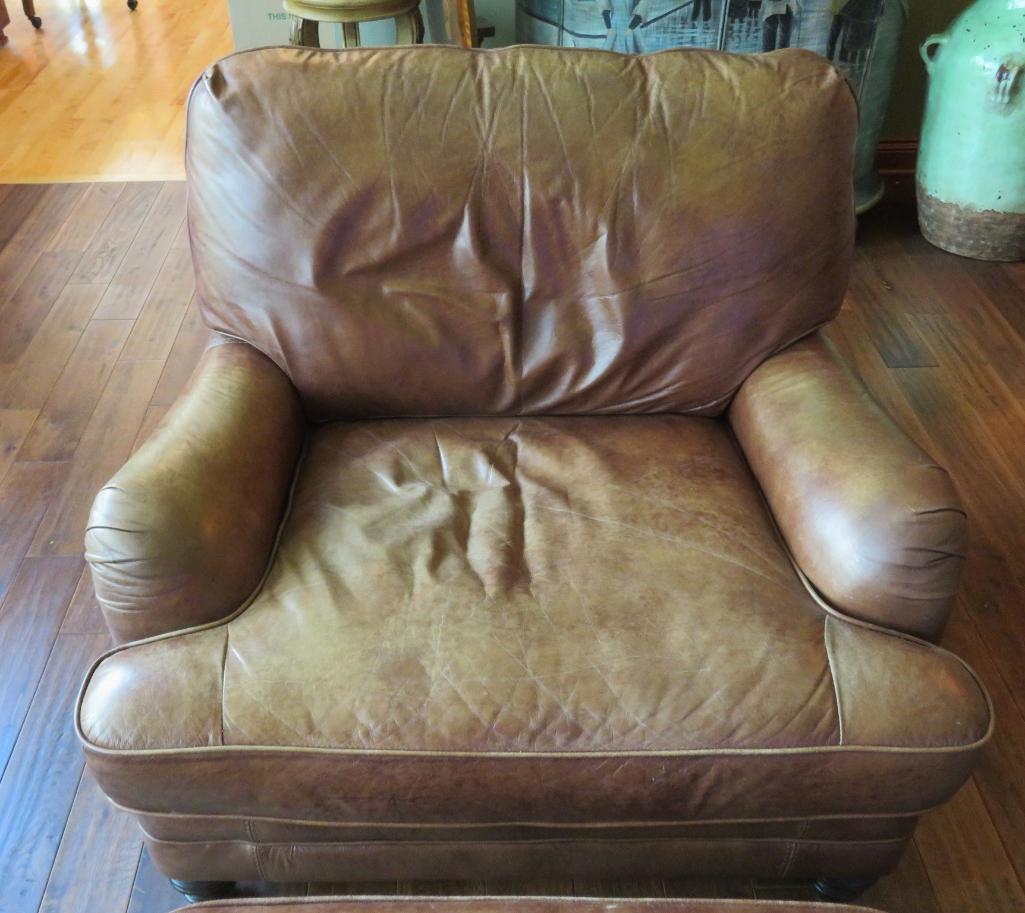 Brown leather chair and ottoman