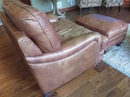 Brown leather chair and ottoman