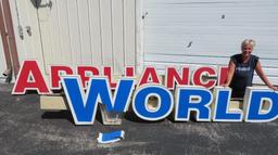 Large Appliance World sign, 12' long World and 16' 3" Appliance