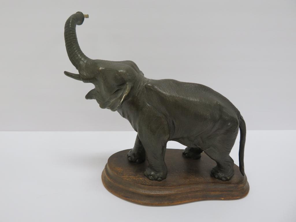 Junghans Elephant swing arm clock, 11 1/2" tall and 9" long