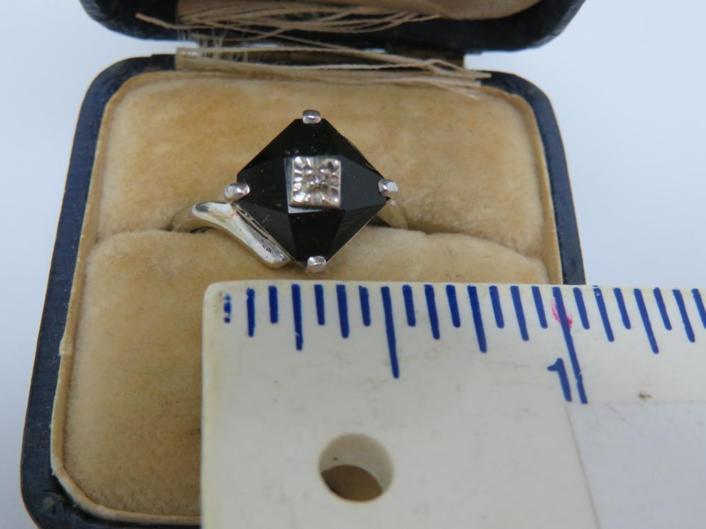 Black onyx and diamond ring, size 7 3/4, with vintage ring box