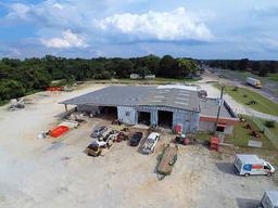 4.2 +/- acres with 14000 +/- square foot building: Enclosed, Fenced