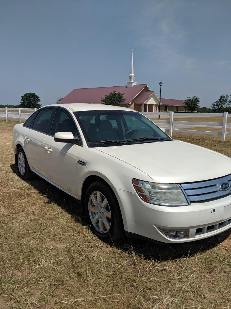 2009 Ford Taurus, VIN - 1FAHP23W49G125071, Showing 91,168 miles, Gas