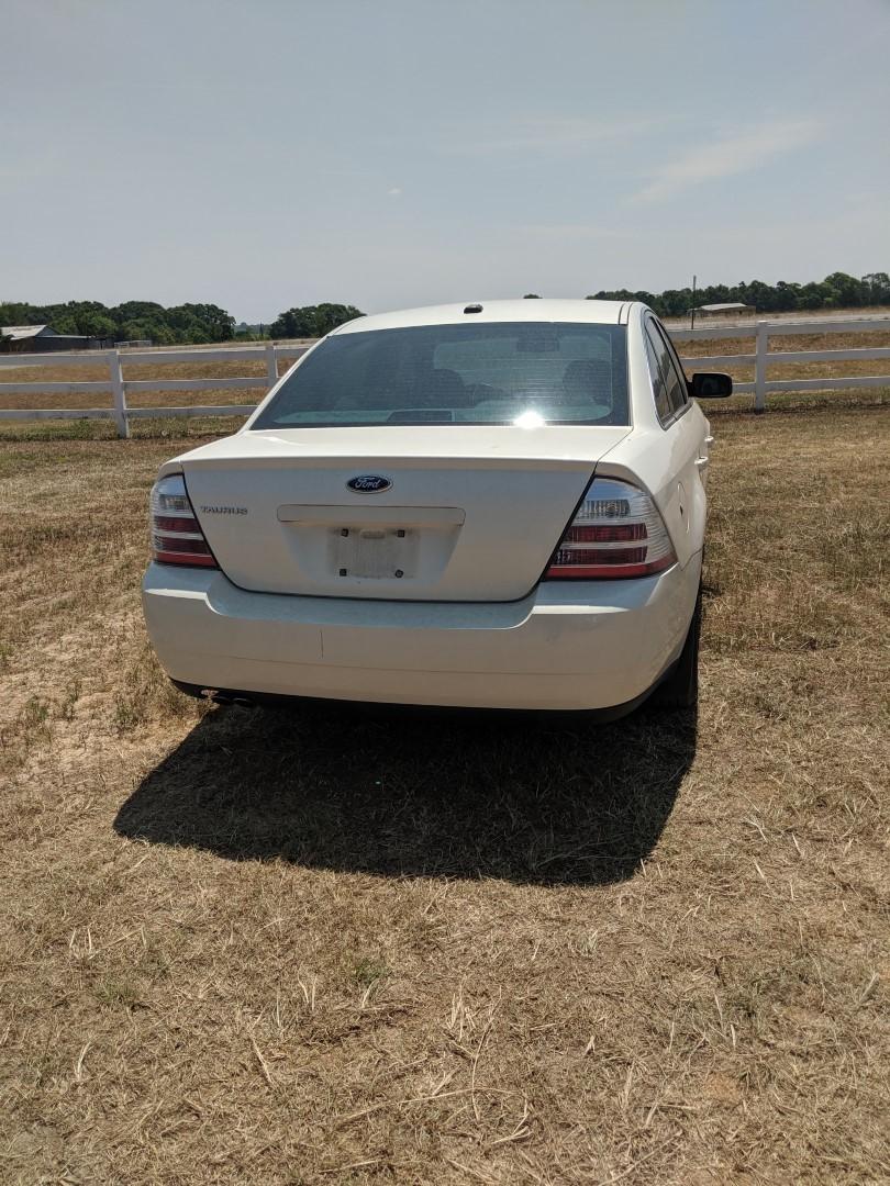 2009 Ford Taurus, VIN - 1FAHP23W49G125071, Showing 91,168 miles, Gas