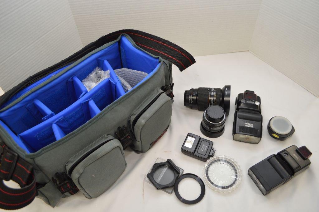 Carrying Bag W/ Nikon Lenses, Various Flashes And Miscellaneous Items