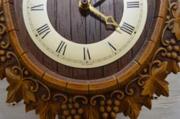 Oval Shape Wood Front Cuckoo Clock w/ Cherubs and Bird, Weights Made in W.